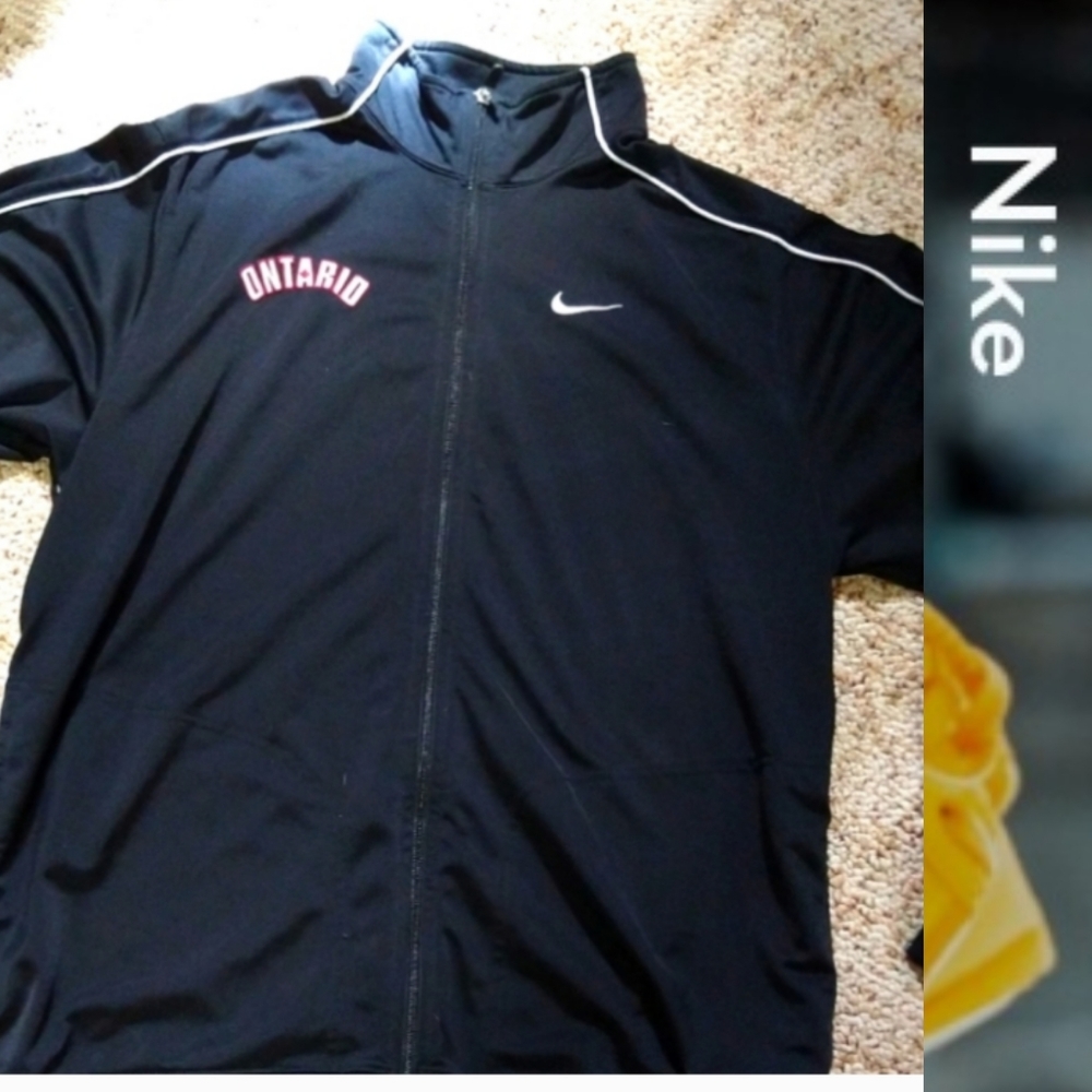 Size XL black an white Nike zip up sweater